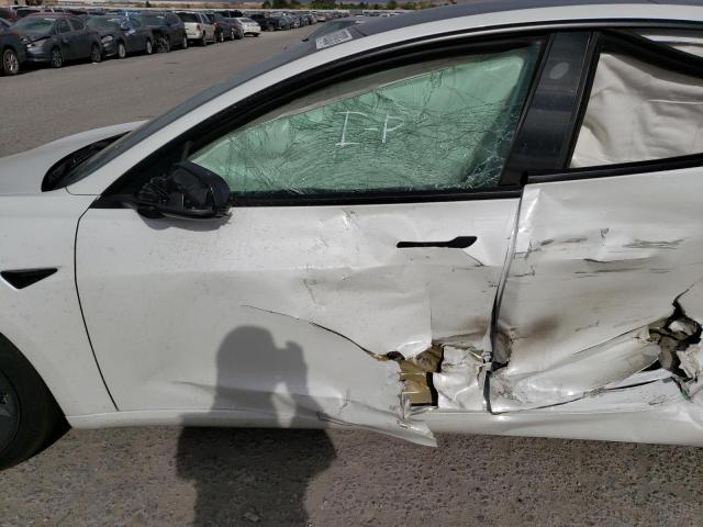 Photo 7 from auction – 2022 TESLA MODEL 3 with VIN 5YJ3E1EA9NF361452
