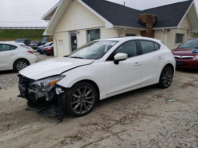 MAZDA 3 TOURING 2018 with VIN 3MZBN1L31JM163404 - Photo from auction
