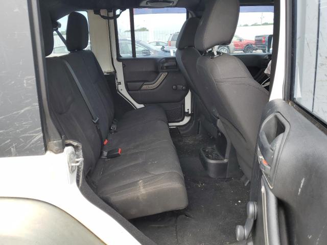 Photo 11 from auction – 2014 JEEP WRANGLER U with VIN 1C4BJWDG2EL254749