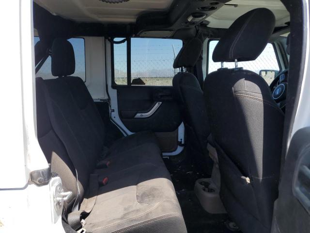 Photo 10 from auction – 2015 JEEP WRANGLER U with VIN 1C4BJWFG8FL653261