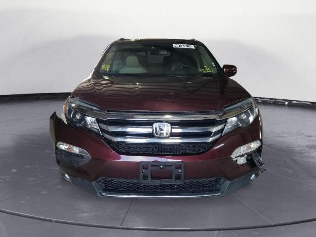 Photo 5 from auction – 2017 HONDA PILOT TOUR with VIN 5FNYF6H97HB039382