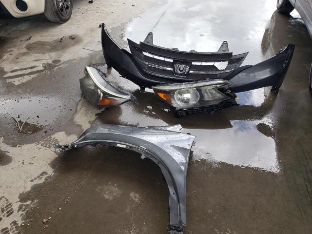 Photo 13 from auction – 2013 HONDA CR-V LX with VIN 2HKRM4H33DH665842