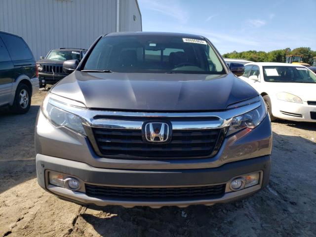 Photo 5 from auction – 2019 HONDA RIDGELINE with VIN 5FPYK3F71KB005058