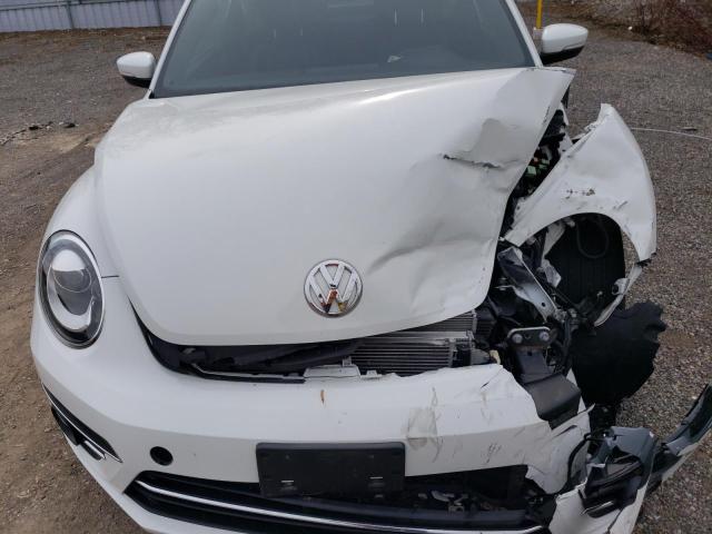 Photo 11 from auction – 2019 VOLKSWAGEN BEETLE SE with VIN 3VWJD7AT8KM714904