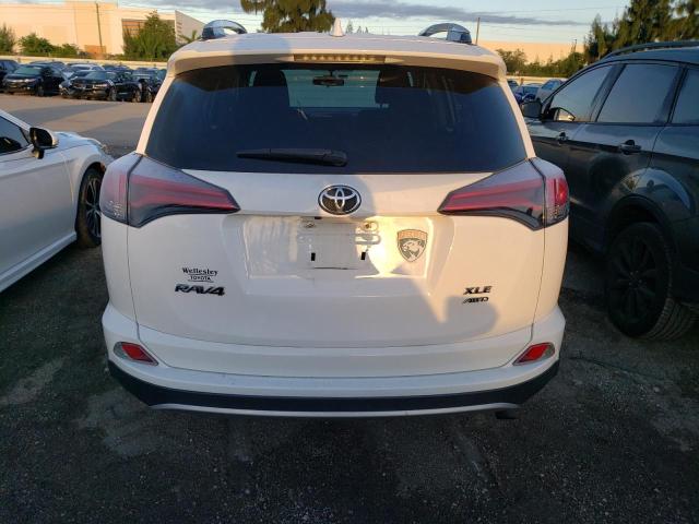Photo 6 from auction – 2016 TOYOTA RAV4 XLE with VIN 2T3RFREV6GW456735