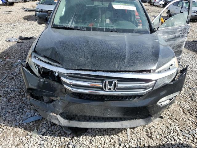 Photo 11 from auction – 2016 HONDA PILOT EX with VIN 5FNYF5H31GB021061