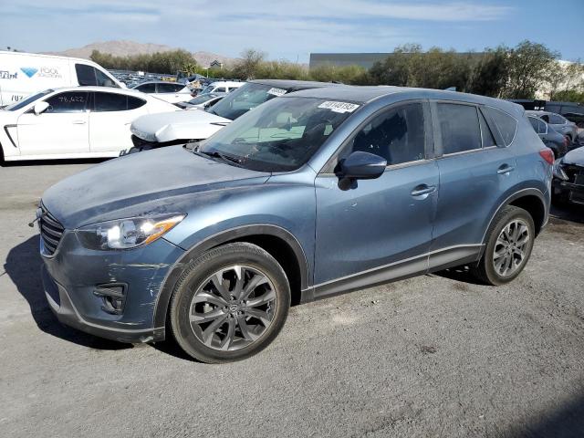 MAZDA CX-5 GT 2016 with VIN JM3KE4DY1G0852702 - Photo from auction