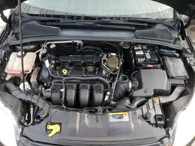 Photo 11 from auction – 2013 FORD FOCUS SE with VIN 1FADP3F20DL318170