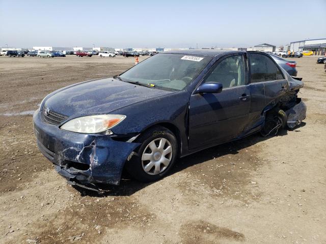 TOYOTA CAMRY LE 2002 with VIN JTDBE32K520031984 - Photo from auction