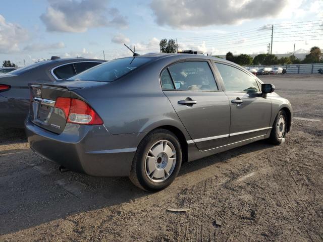 Photo 3 from auction – 2011 HONDA CIVIC HYBR with VIN JHMFA3F29BS000263