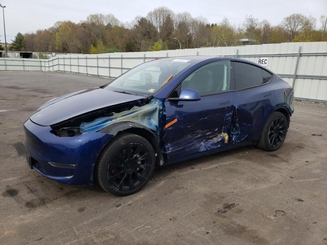 TESLA MODEL Y 2021 with VIN 5YJYGAEE9MF143464 - Photo from auction