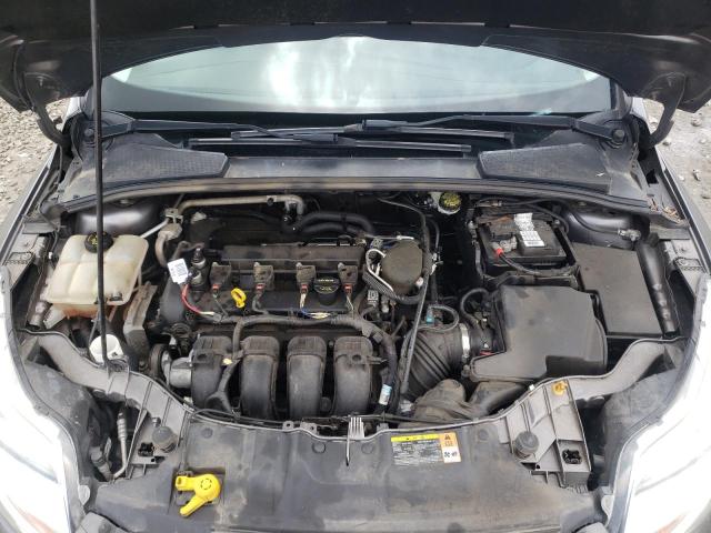 Photo 11 from auction – 2014 FORD FOCUS SE with VIN 1FADP3F28EL103833