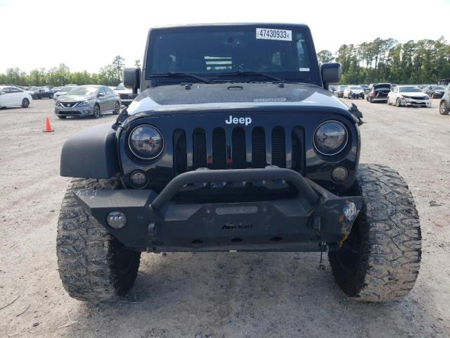 Photo 5 from auction – 2015 JEEP WRANGLER U with VIN 1C4BJWFG0FL604071