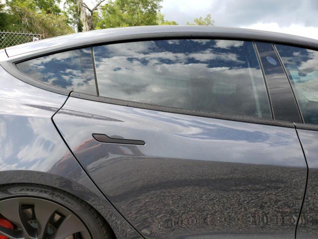 Photo 10 from auction – 2021 TESLA MODEL 3 with VIN 5YJ3E1EC2MF061865