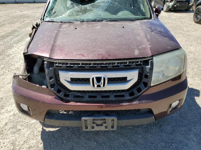 Photo 12 from auction – 2011 HONDA PILOT TOUR with VIN 5FNYF4H9XBB030770