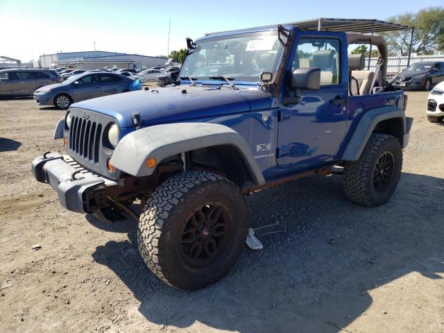 JEEP WRANGLER X 2009 with VIN 1J4FA24179L787945 - Photo from auction