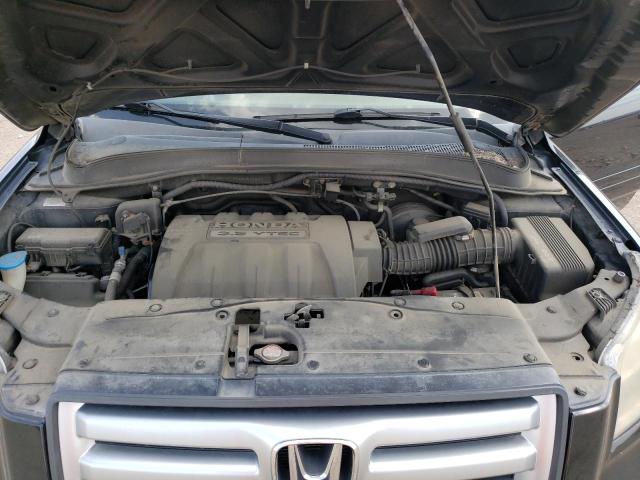 Photo 12 from auction – 2006 HONDA PILOT EX with VIN 2HKYF18526H534877