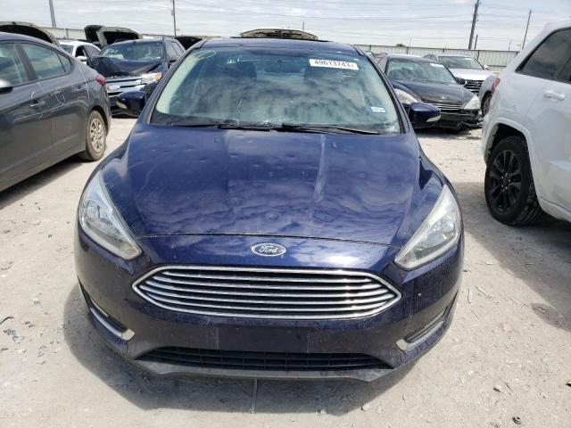 Photo 5 from auction – 2016 FORD FOCUS TITA with VIN 1FADP3J21GL358916
