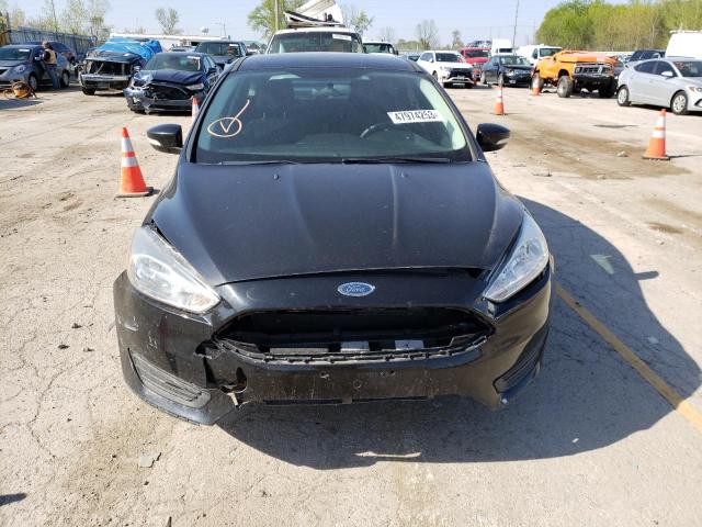 Foto 5 de la subasta – 2015 FORD FOCUS SE con VIN 1FADP3K25FL317184