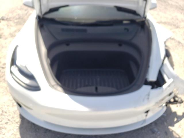 Photo 11 from auction – 2022 TESLA MODEL 3 with VIN 5YJ3E1EA8NF316194