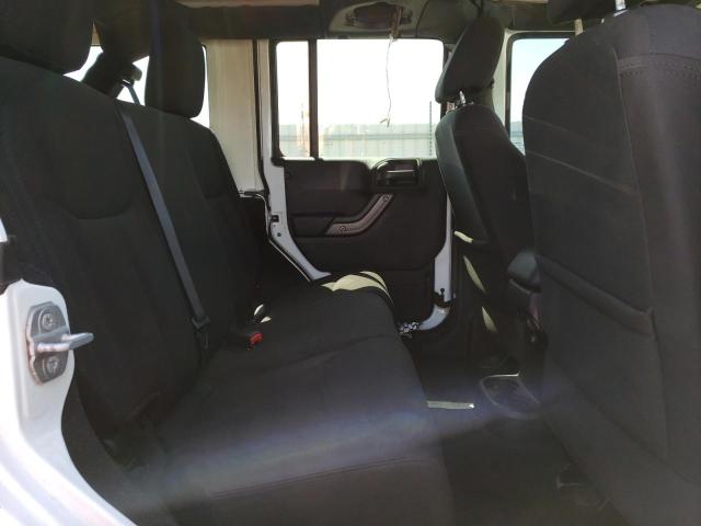 Photo 11 from auction – 2014 JEEP WRANGLER U with VIN 1C4BJWDG1EL150432