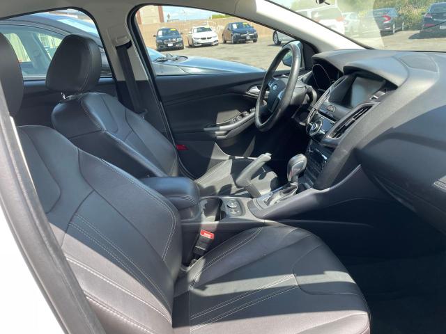 Photo 5 from auction – 2014 FORD FOCUS TITA with VIN 1FADP3J20EL321630