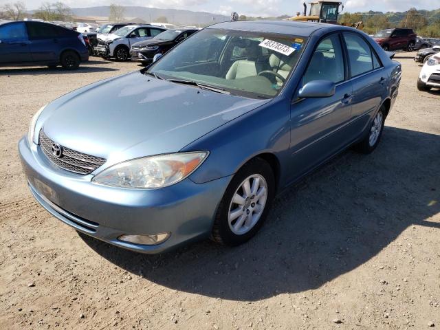 TOYOTA CAMRY LE 2004 with VIN 4T1BE30K24U829112 - Photo from auction