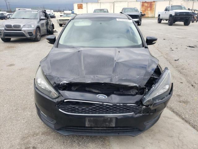 Foto 5 de la subasta – 2017 FORD FOCUS SEL con VIN 1FADP3M24HL211101