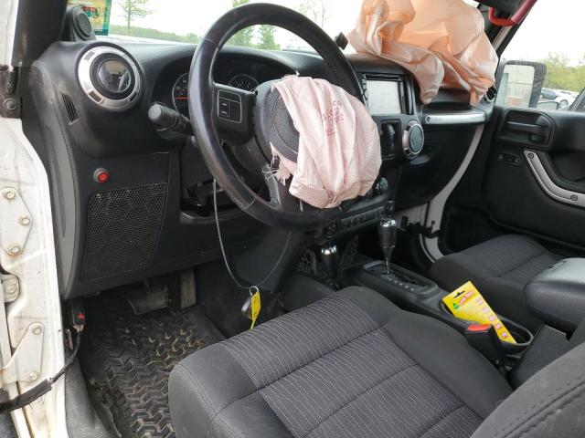 Photo 8 from auction – 2011 JEEP WRANGLER S with VIN 1J4AA5D13BL560186