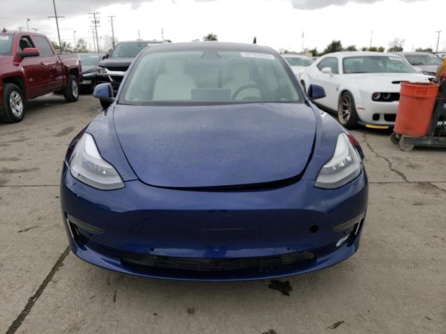 Photo 5 from auction – 2021 TESLA MODEL 3 with VIN 5YJ3E1EA7MF987404