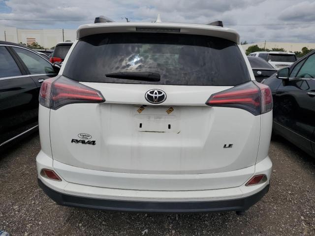 Photo 6 from auction – 2017 TOYOTA RAV4 LE with VIN JTMZFREV8HJ702703