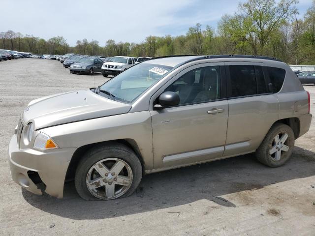 JEEP COMPASS 2010 with VIN 1J4NF1FB6AD624022 - Photo from auction