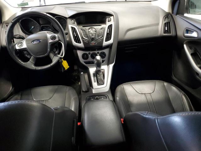 Foto 8 de la subasta – 2014 FORD FOCUS SE con VIN 1FADP3K22EL215002