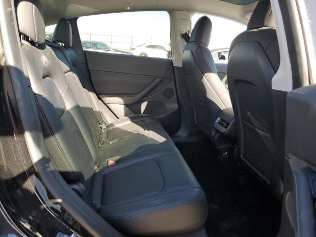 Photo 10 from auction – 2021 TESLA MODEL Y with VIN 5YJYGDEE0MF161112