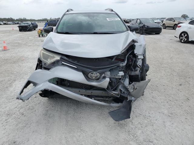 Photo 5 from auction – 2018 TOYOTA RAV4 LE with VIN 2T3ZFREV2JW461972