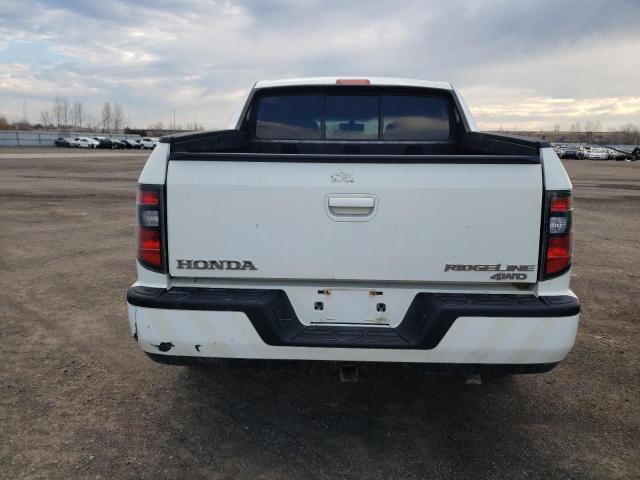 Photo 6 from auction – 2012 HONDA RIDGELINE with VIN 5FPYK1F74CB552167