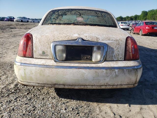 Photo 6 from auction – 2002 LINCOLN TOWN CAR E with VIN 1LNHM81W12Y649301