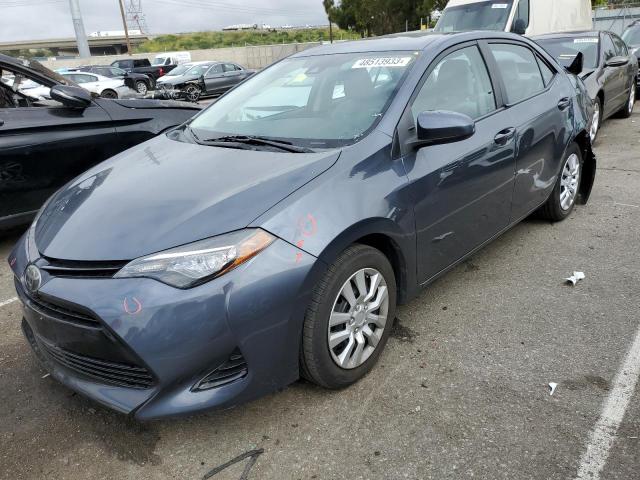 TOYOTA COROLLA L 2017 with VIN 5YFBURHE8HP595974 - Photo from auction