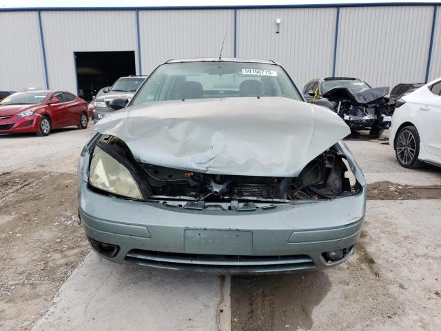 Фото 5 с аукциона – 2005 FORD FOCUS с VIN 1FAHP34N05W259748