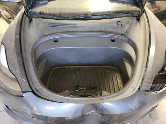Photo 11 from auction – 2022 TESLA MODEL 3 with VIN 5YJ3E1EB7NF112382