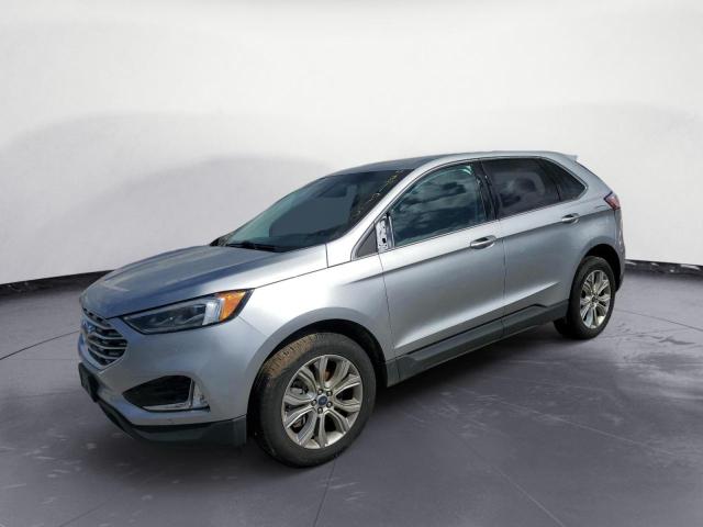 FORD EDGE TITAN 2022 with VIN 2FMPK4K92NBA37970 - Photo from auction