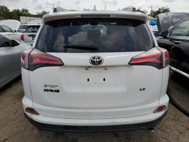 Photo 6 from auction – 2018 TOYOTA RAV4 LE with VIN JTMZFREV9JJ195218
