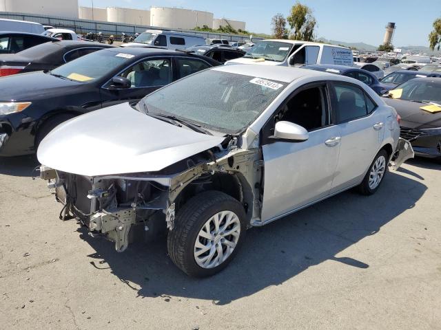 TOYOTA COROLLA L 2018 with VIN 5YFBURHE0JP787217 - Photo from auction