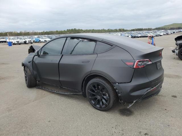 Photo 2 from auction – 2021 TESLA MODEL Y with VIN 5YJYGAEE4MF234898