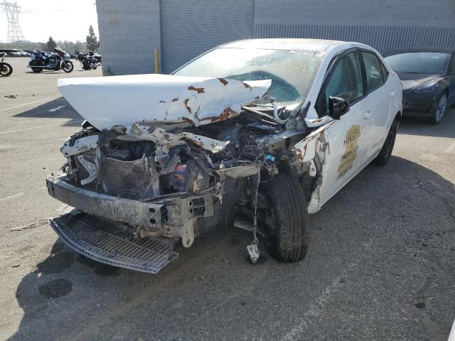 TOYOTA COROLLA L 2018 with VIN 5YFBURHE2JP749052 - Photo from auction