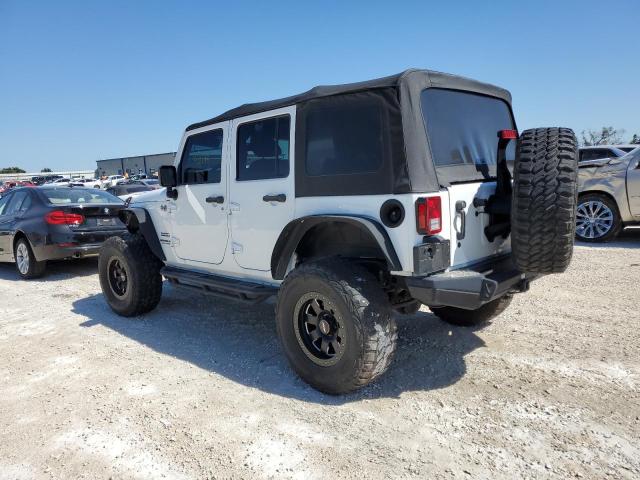 Photo 2 from auction – 2016 JEEP WRANGLER U with VIN 1C4BJWDG2GL333759