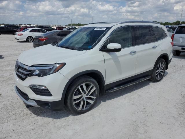 HONDA PILOT ELIT 2018 with VIN 5FNYF6H00JB019563 - Photo from auction