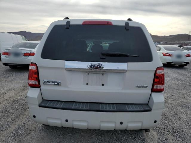 Photo 6 from auction – 2009 FORD ESCAPE LIM with VIN 1FMCU94G09KB64083