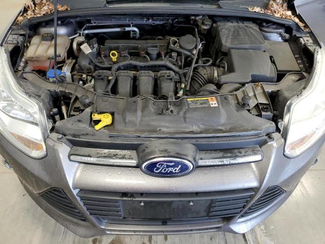 Foto 11 de la subasta – 2014 FORD FOCUS SE con VIN 1FADP3K22EL215002