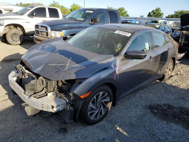 HONDA CIVIC EX 2018 with VIN 2HGFC2F72JH563874 - Photo from auction